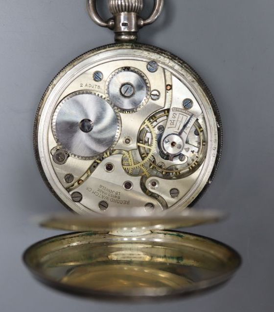 A 1920s silver open face Record keyless lever pocket watch, with a white metal albert, case diameter 48mm.